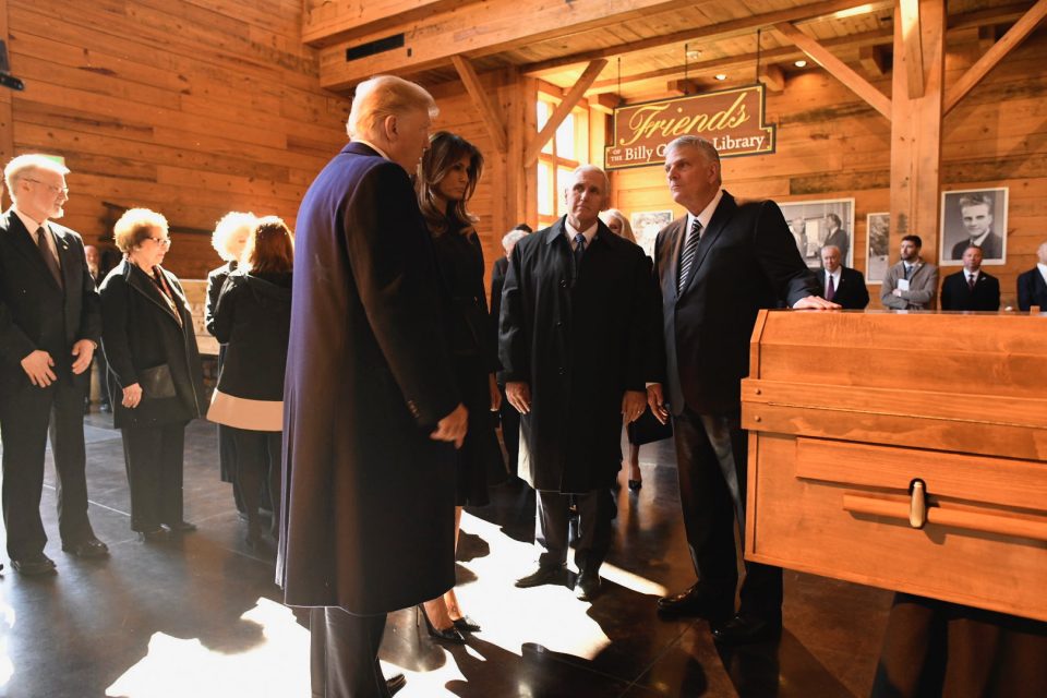 President Donald Trump, First Lady Melania Trump, Franklin Graham stand by casket
