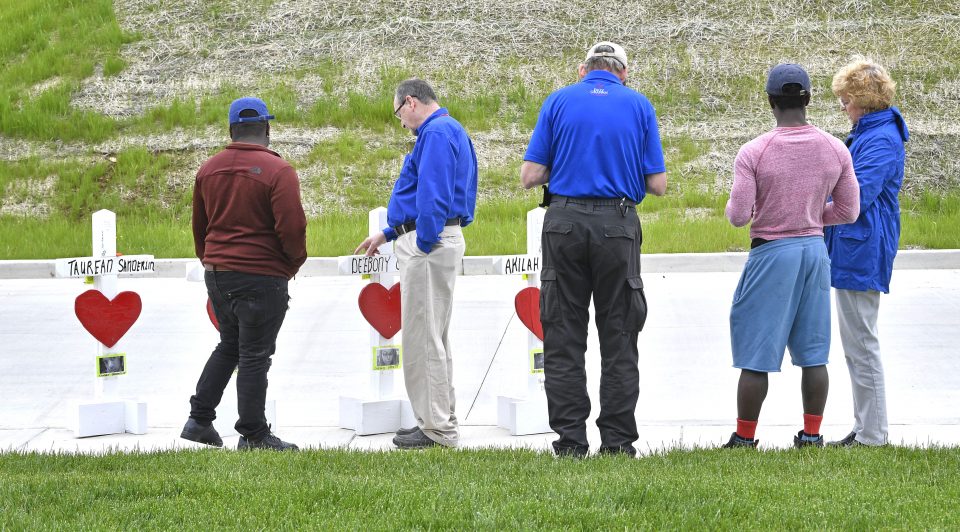 Chaplains stand, talk with visitors at memorial