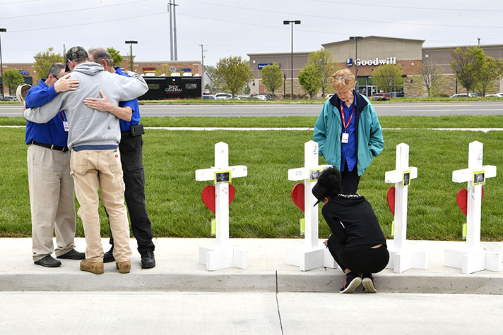 chaplains pray with man