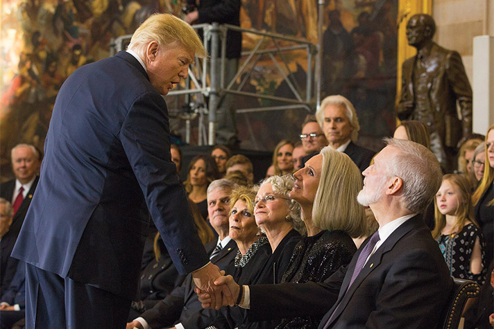 President Donald Trump offering condolences to Billy Graham's family