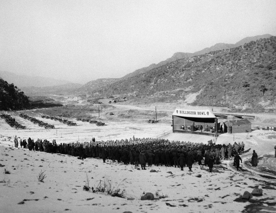Billy Graham preached the Gospel to the troops in Korea during Christmas 1952. Despite temperatures below freezing, thousands stood outside to listen.
