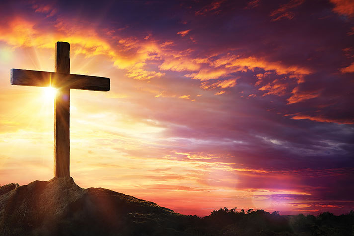 A large cross at sunset