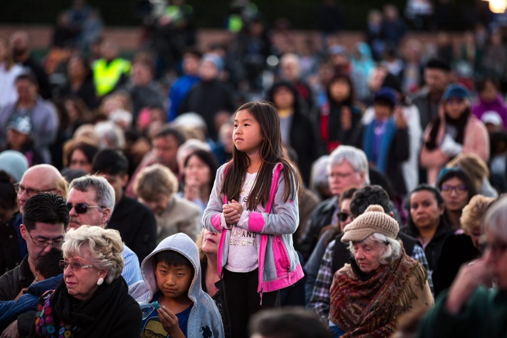 girl stands in crowd