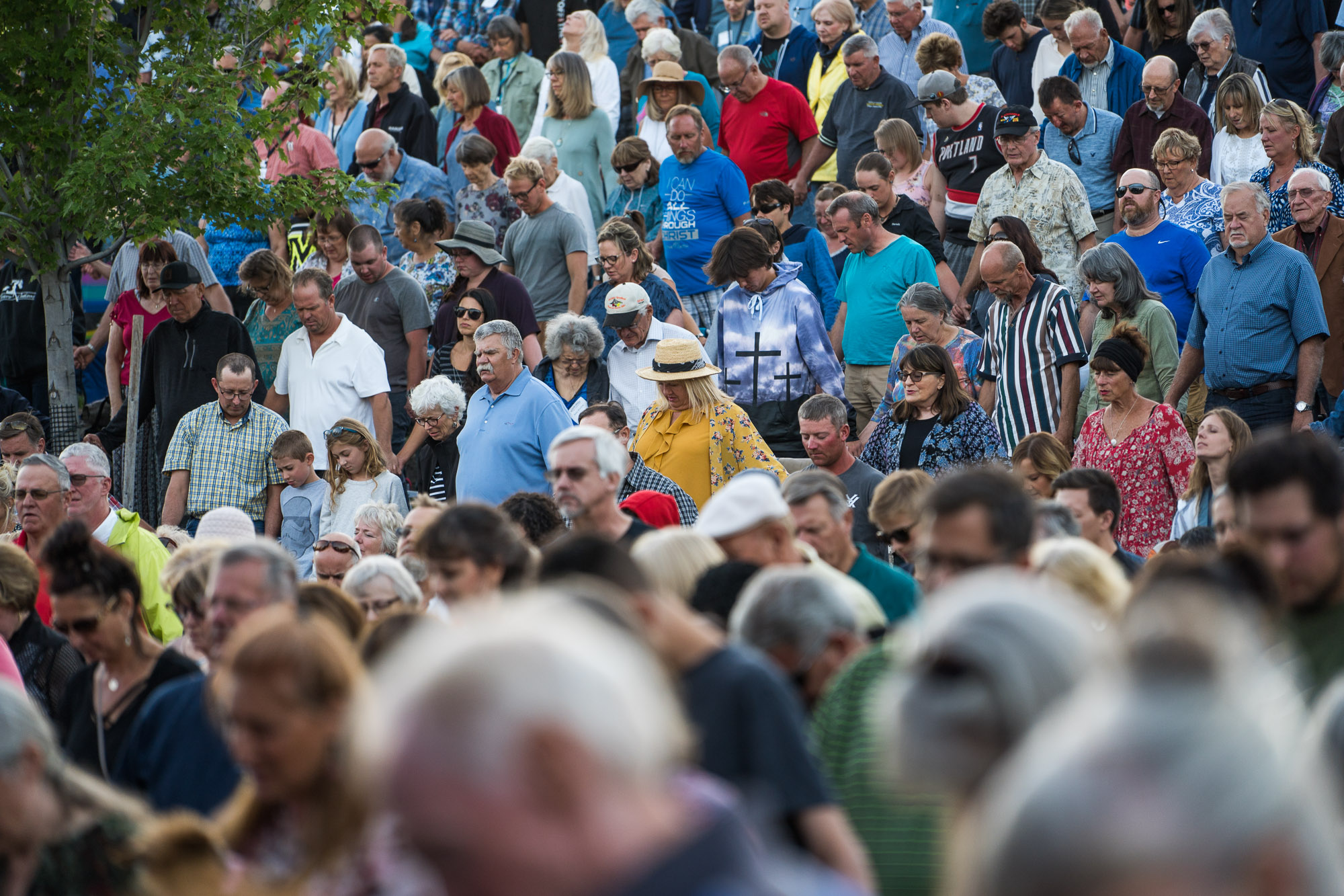 Crowd praying together