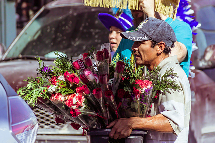 Man selling roses photograph