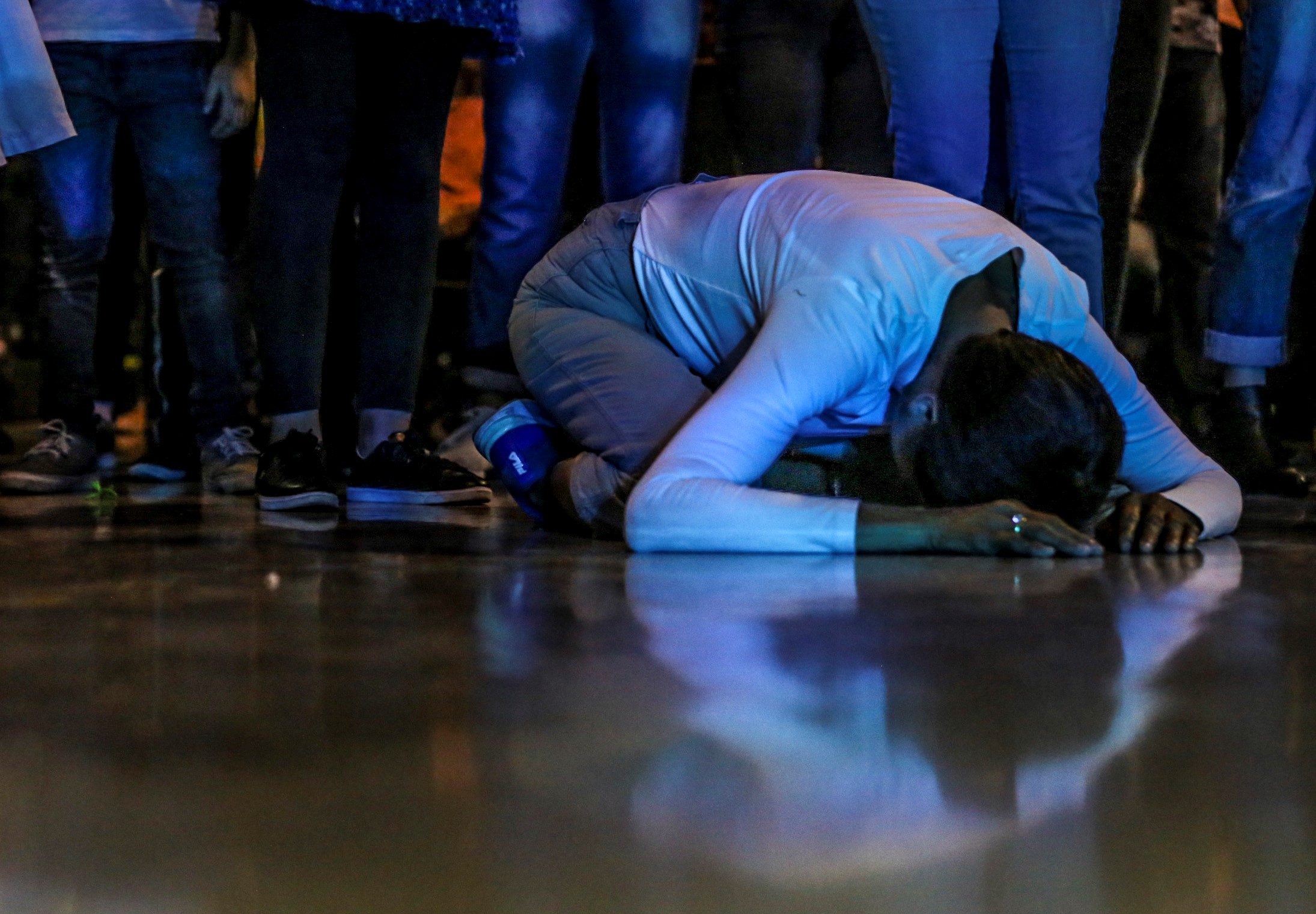 worshiping on floor