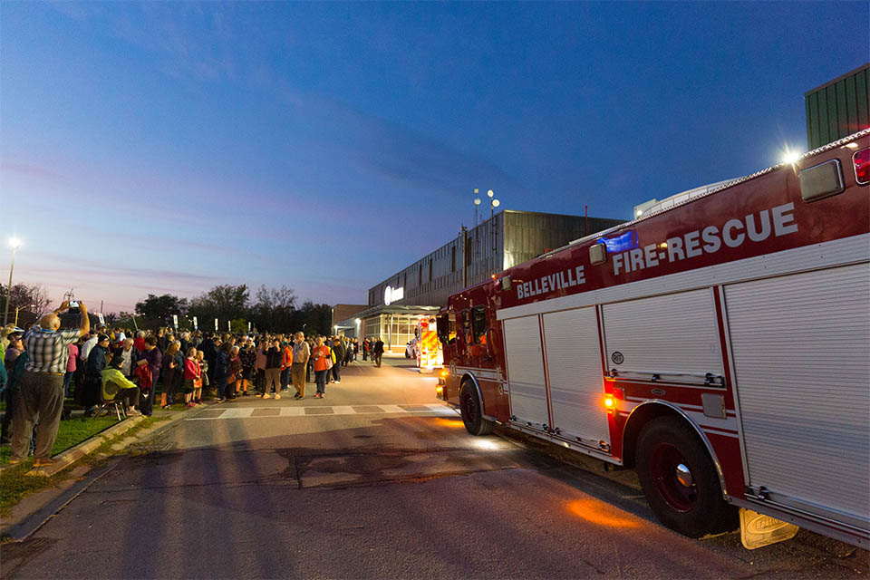 The Belleville Fire Department cleared the CAA Arena while thousands stood outside, lifting their voices in worship.