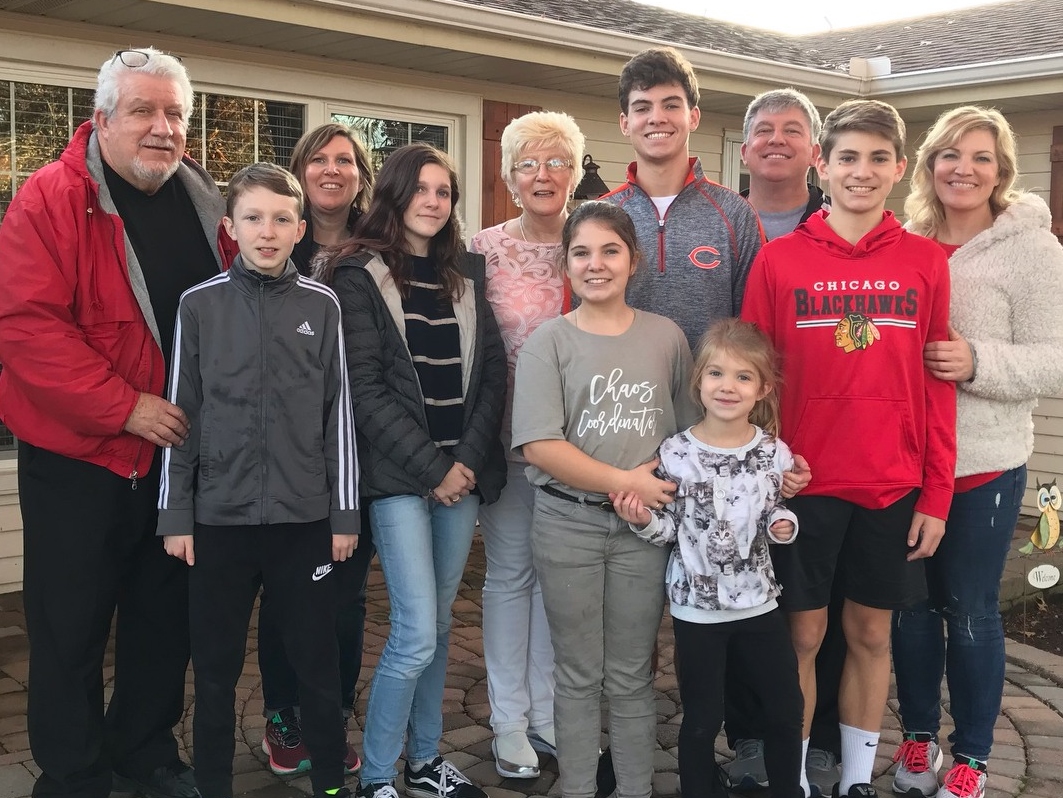 Leaving a legacy of faith is valuable to Denise and Bob Wright. Here, the family gathers for Thanksgiving.
