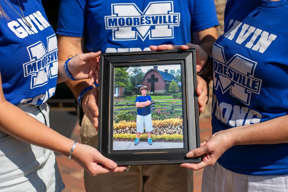 Family with photo of Gavin