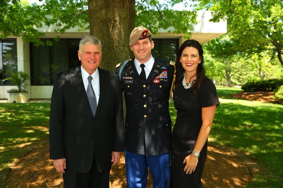 Edward Graham standing with Franklin Graham and Cissie Graham Lynch