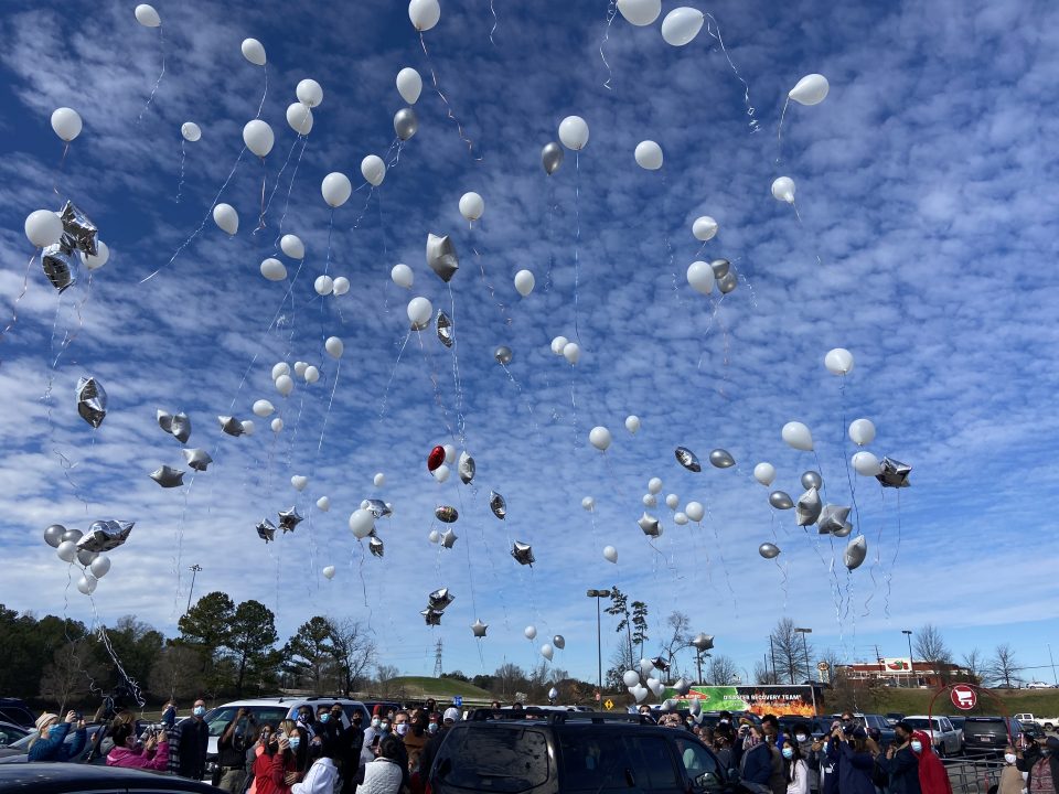 Memorial balloons released in air