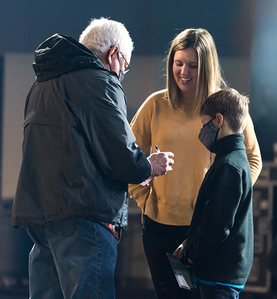 woman with boy standing with counselor