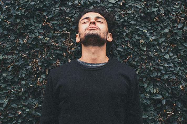 man with eyes closed