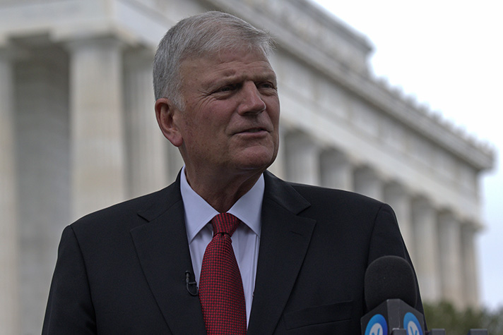 Franklin Graham looking to side, Lincoln Memorial in background