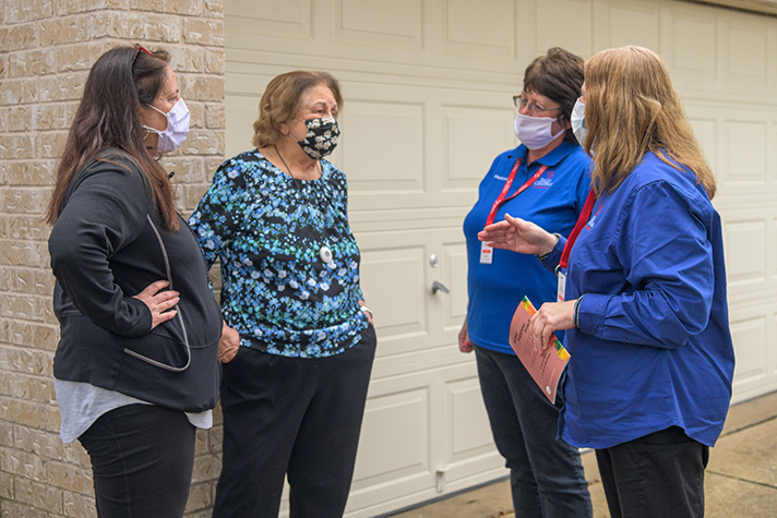 chaplains talk to residents