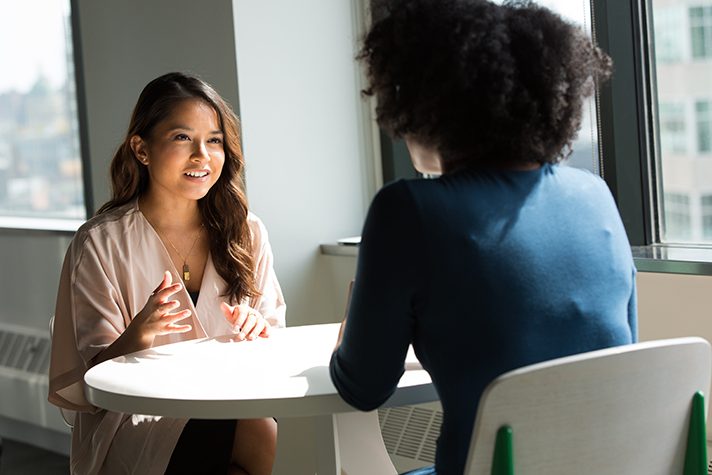 two women talking