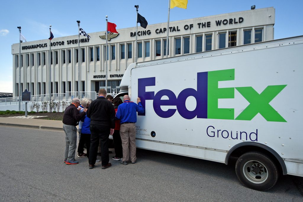 Chaplains lay their hands on FedEx truck after shooting and pray with driver