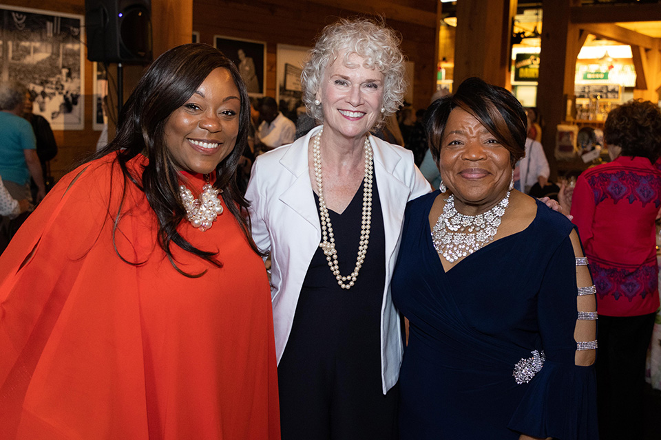 Ruth Graham in picture with two attendees