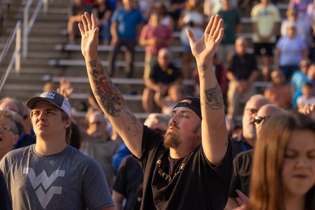 Man raising hands in worship