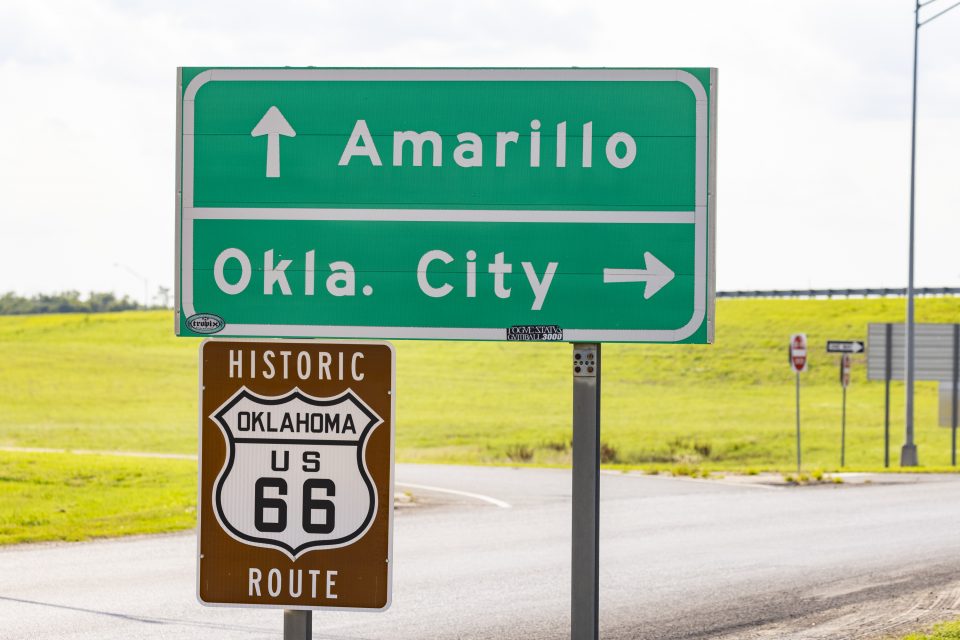 Road sign with "Amarillo" and "Oklahoma City"