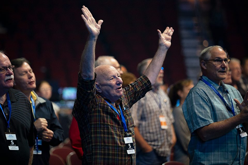 man praising God