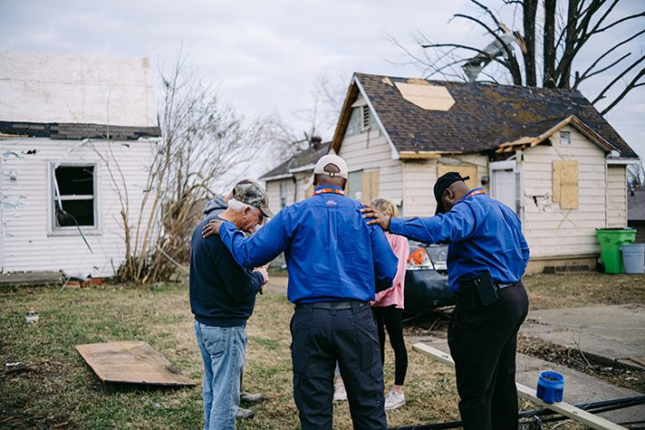 Billy Graham chaplains pray with homeowner