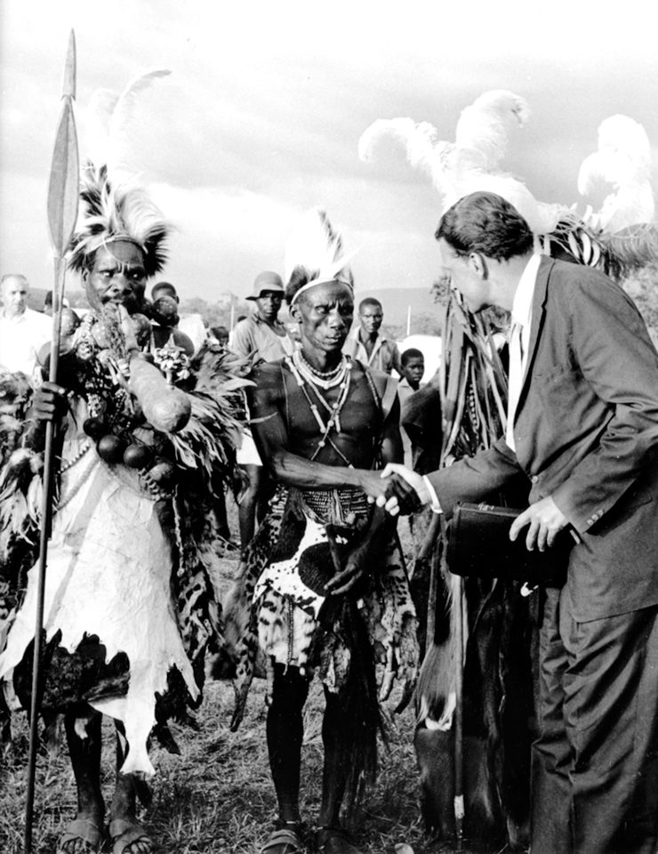 Billy Graham shaking hands with Kenyan