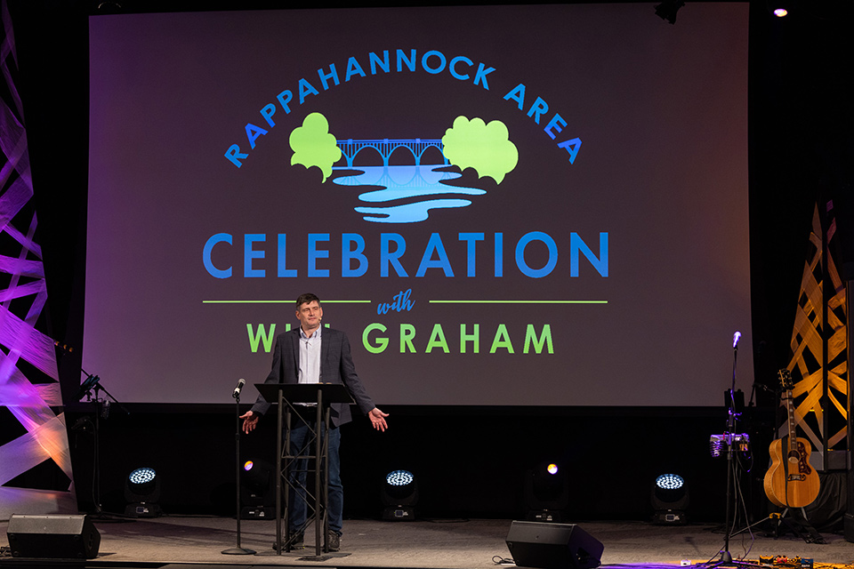 Will Graham with Rappahannock Area Celebration sign