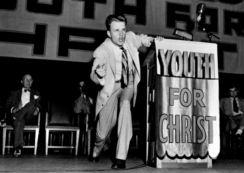 Billy Graham at Youth for Christ podium