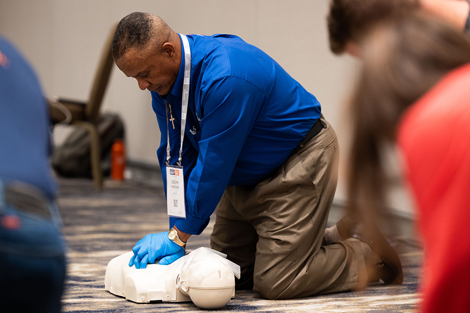man performing CPR