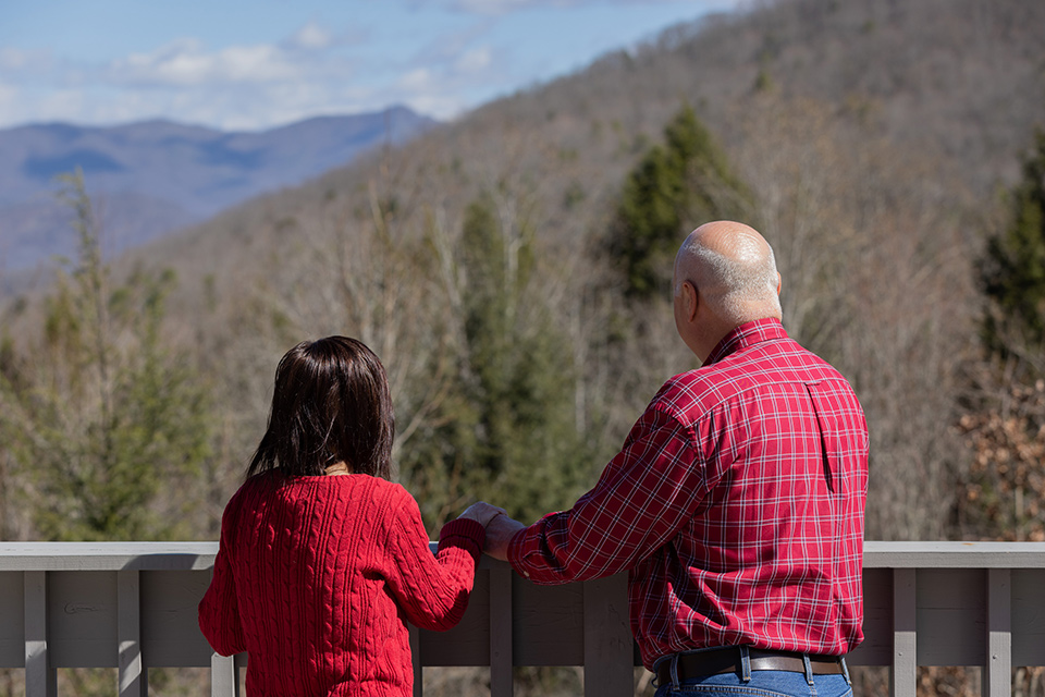 couple looks at mountains