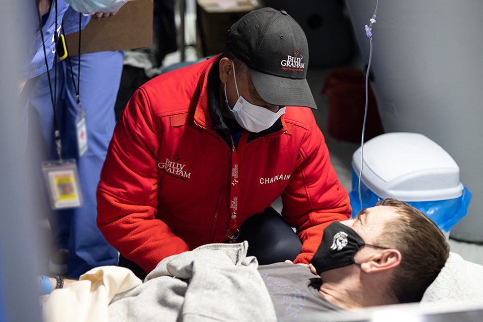 chaplain with patient