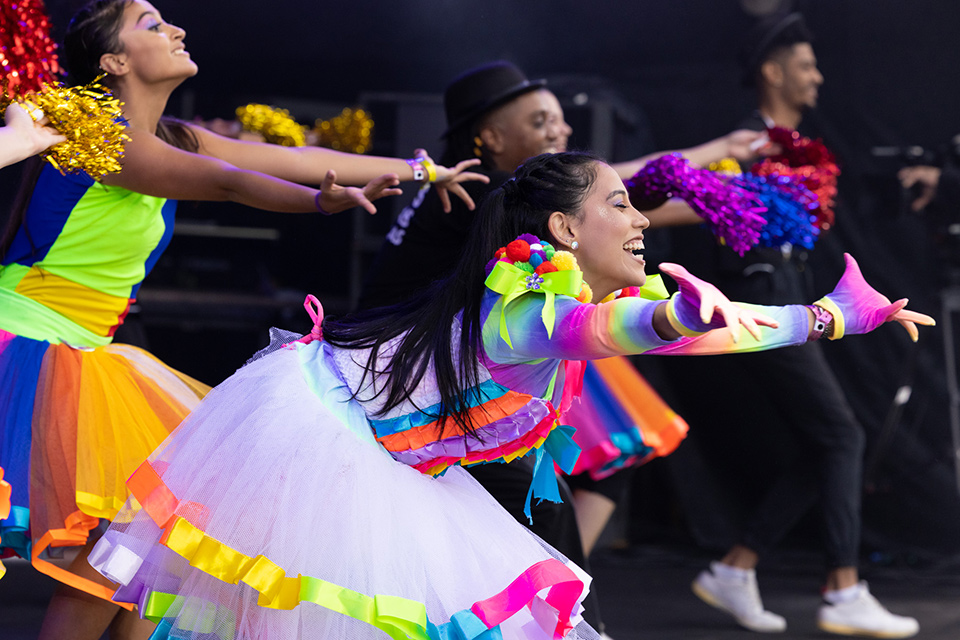 dancers in colorful outfits
