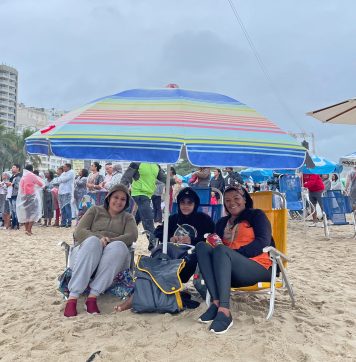 family under umbrella