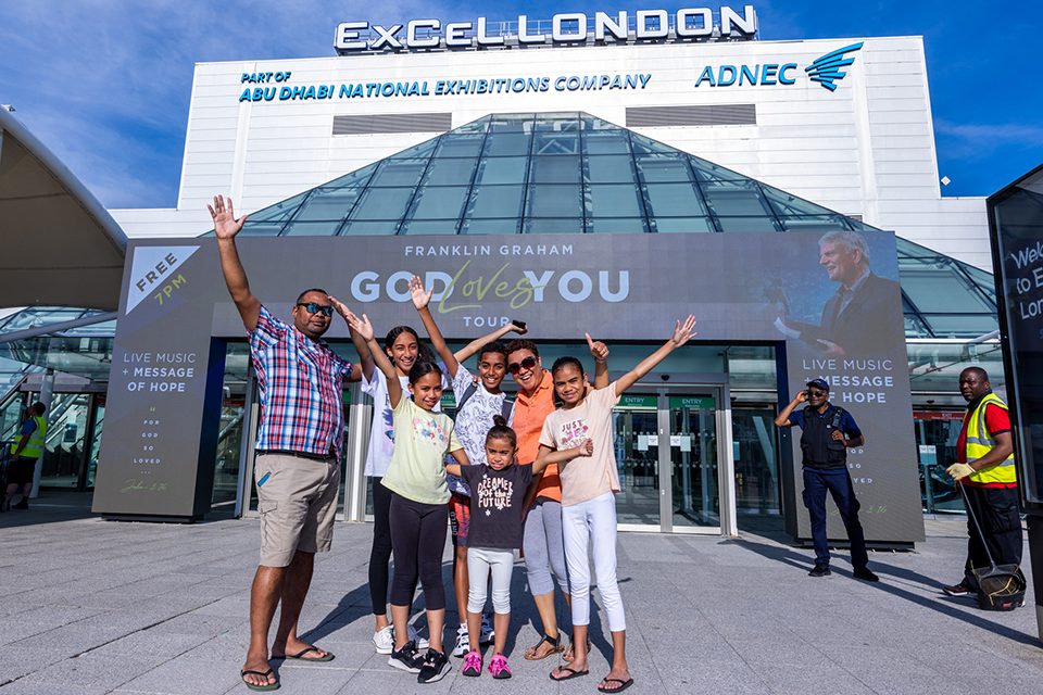 family in front of ExCeL London