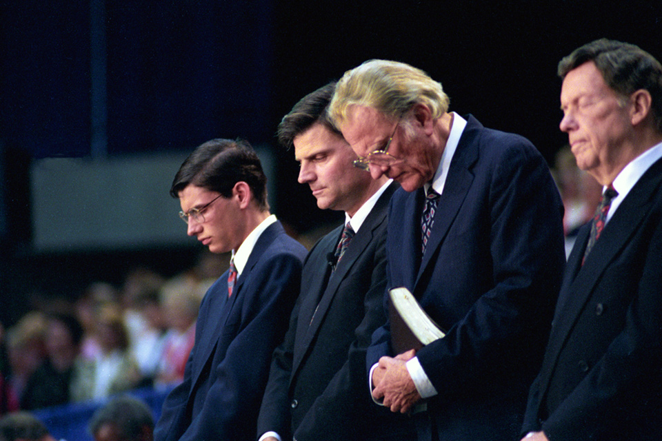 Will Graham, Franklin Graham, Billy Graham praying