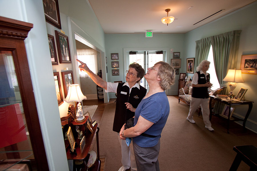 guests admiring photos in the Graham Family homeplace