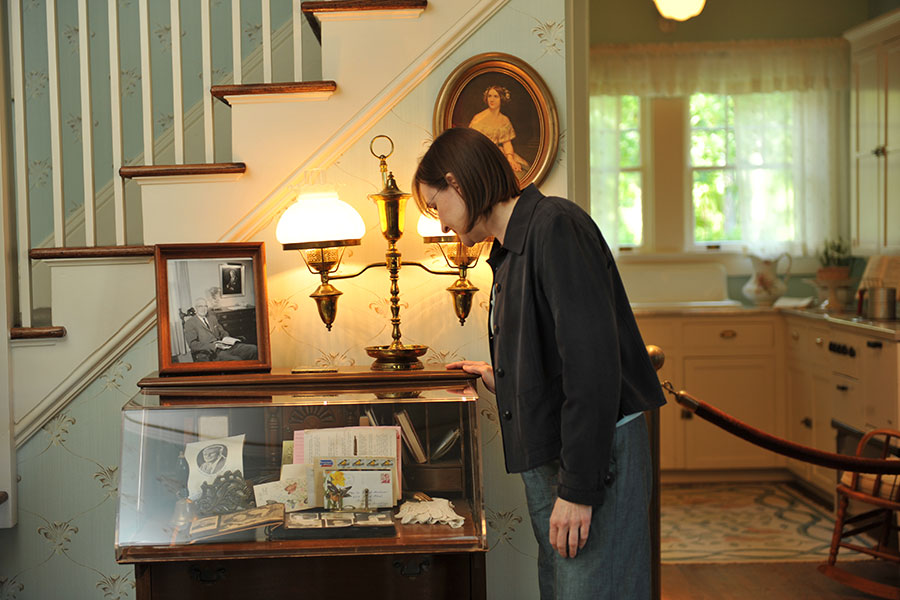 guest admiring a desk in the Graham Family homeplace