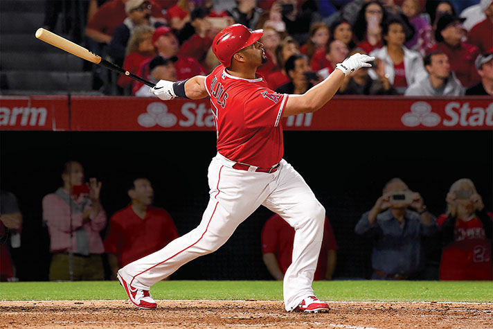 Baseball star Pujols says he's 100% committed to Jesus