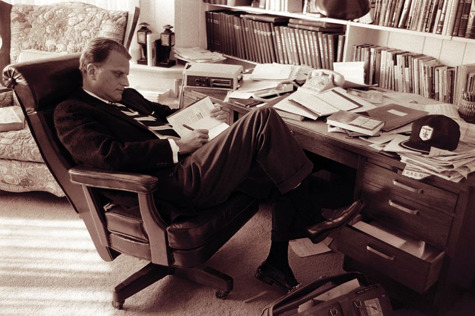 Billy Graham at his desk