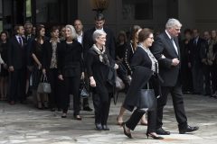 Family members, including Franklin Graham, right, walk to vehicles before the body of Rev. Billy Graham leaves the Billy Graham Training Center at the Cove on Saturday, Feb. 24, 2018 in Asheville, N.C. Graham's body will be brought to his hometown of Charlotte on Saturday, Feb. 24, as part of a procession expected to draw crowds of well-wishers. (AP Photo/Kathy Kmonicek, Pool)