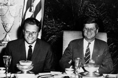 Billy Graham joins President John F. Kennedy at the National Prayer Breakfast on Feb. 9, 1961. Graham spoke at all three prayer breakfasts while Kennedy was in office.