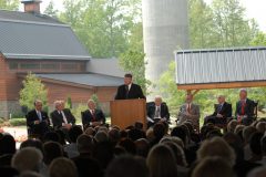 Platform guests at the Billy Graham Library dedication were (l-r) Graeme Keith; George Beverly Shea, Cliff Barrows; Franklin Graham; Billy Graham; Presidents George H.W. Bush, Jimmy Carter and Bill Clinton.