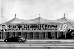 Between Sept. 25 and Nov. 20 of 1949, some 350,000 people gather under a huge tent—often called a "canvas cathedral"—in Los Angeles to hear Billy Graham preach.