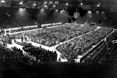 During the 1954 Crusade in North London, Billy Graham preaches to overflow crowds at the 1,200-seat Harringay Arena for nearly three months.