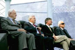 In July 2006, Billy Graham (far right) participates in the Metro Maryland Franklin Graham Festival in Baltimore, along with (left to right) George Beverly Shea, Cliff Barrows and his son Franklin.