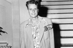Born in 1918, Billy Graham, a native of North Carolina, commits his life to serving Jesus Christ at age 15 (photo: late 1930s).