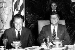 Feb. 9, 1961: Billy Graham and President John F. Kennedy, seated at the head table at the National Prayer Breakfast in the Grand Ballroom of The Mayflower Hotel, Washington, D.C.