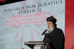 May 11: His Holiness Patriarch Mor Ignatius Aphrem II, Patriarch of Antioch and All the East Supreme Head of the Universal Syrian Orthodox Church, reads the Scriptures to encourage some 600 participants gathered at the World Summit in Defense of Persecuted Christians.