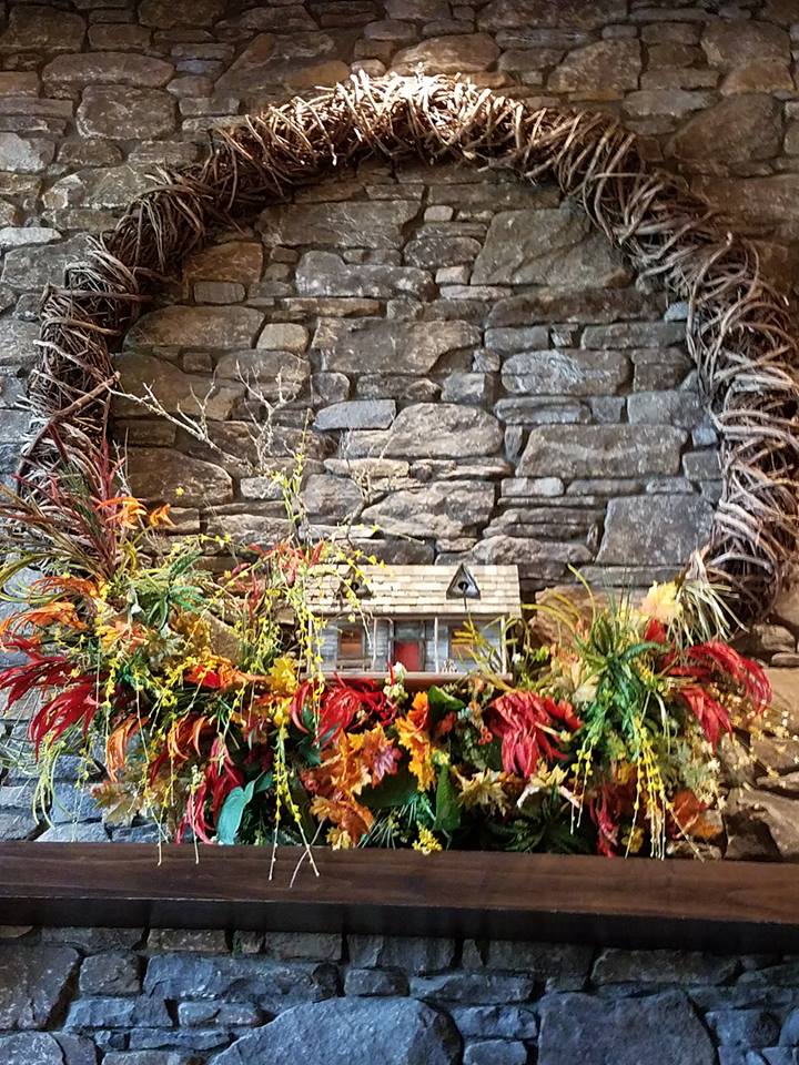 Fall wreath above fireplace at TC Notes from the Cove